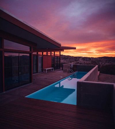 desert homes for sale water poll near house during golden hour
