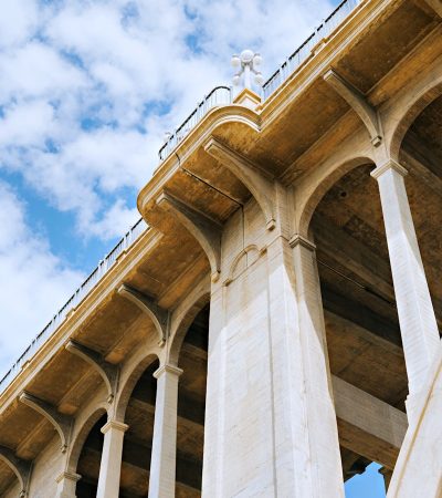 East Pasadena a very tall bridge with some pillars under it