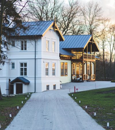Elegant country home exterior in Swansboro with manicured grounds and architectural detail