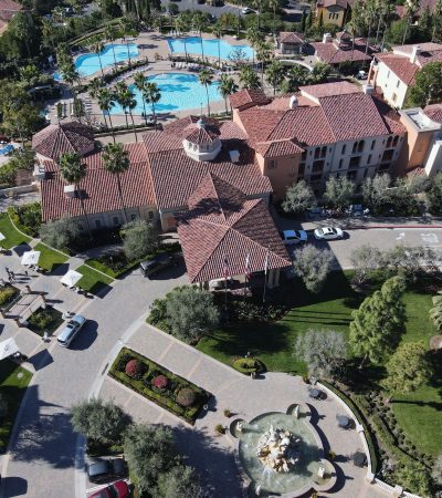 Luxury homes in Rancho Santa Fe, California showcasing high-end real estate architecture and landscaping