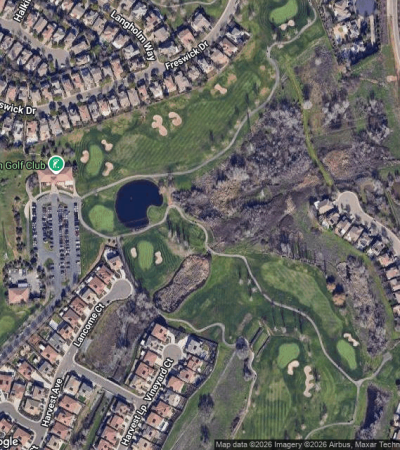 Upscale residential property in Carlsbad foothills with modern architecture and landscaping