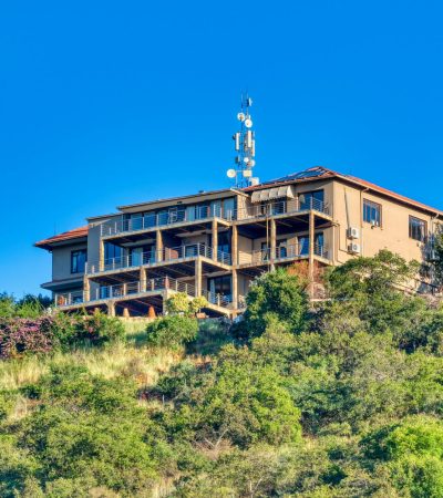 Elegant luxury home in Trabuco Canyon, Orange County with scenic mountain backdrop and manicured landscaping