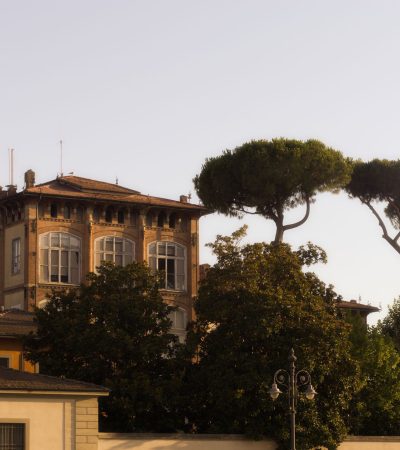 Elegant Tuscany-style home with warm terracotta exterior and vineyard views in Los Angeles luxury real estate market