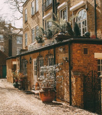 english homes for sale los angeles brown concrete brick house with plants placed outside