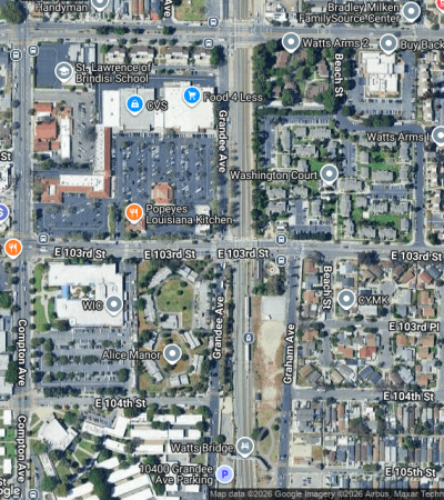 Vibrant Watts neighborhood street in Los Angeles showcasing local architecture and community character