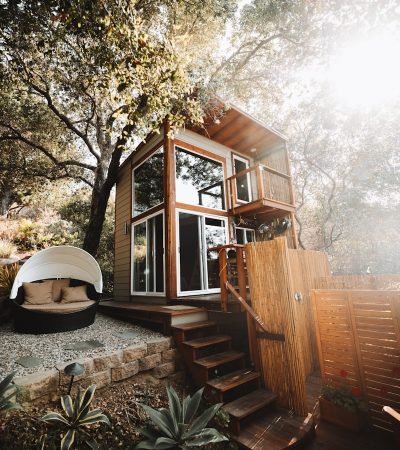 Topanga brown wooden house near trees during daytime