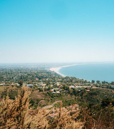 gated homes for sale in pacific palisades a view of the ocean from a hill top